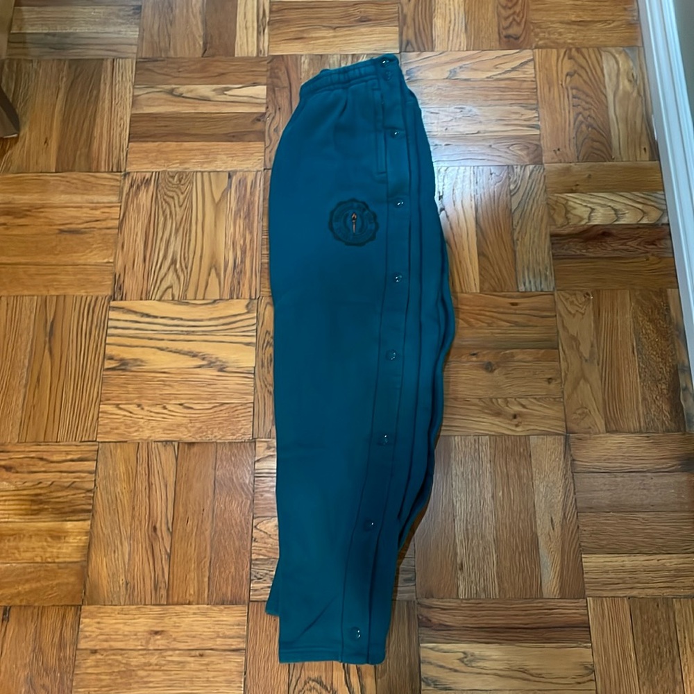 Green champion pants with a cute little design